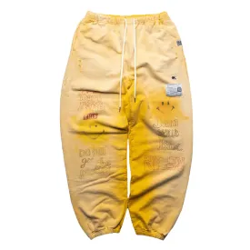 Maison Mihara Yasuhiro Bleached Smiley Face Sweatpants Yellow